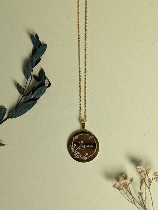 Elegant Golden Round Engraved Pendant